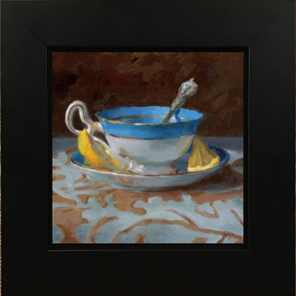 Blue Teacup with Lemon Wedges